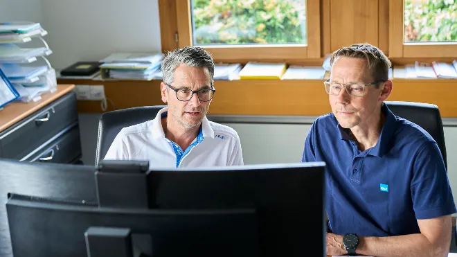Büchler und Kramer am PC